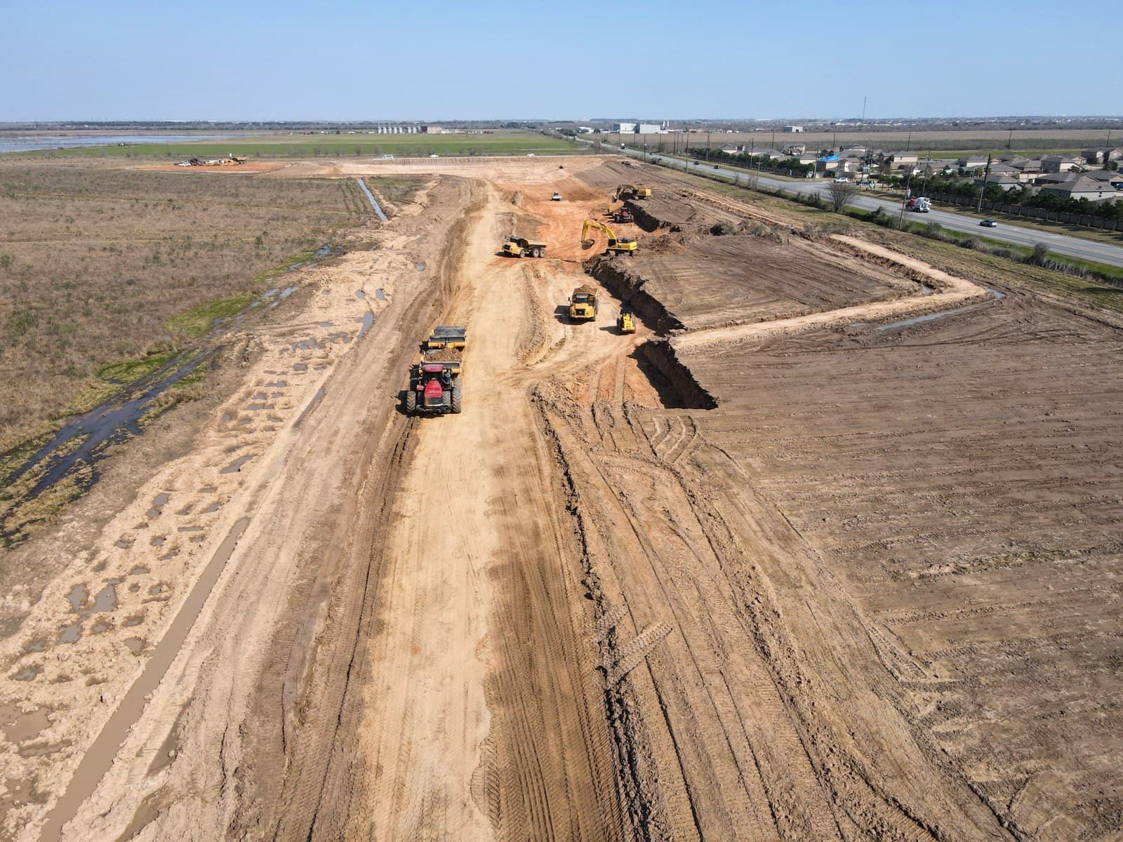 Shaping grade hauling dirt building future